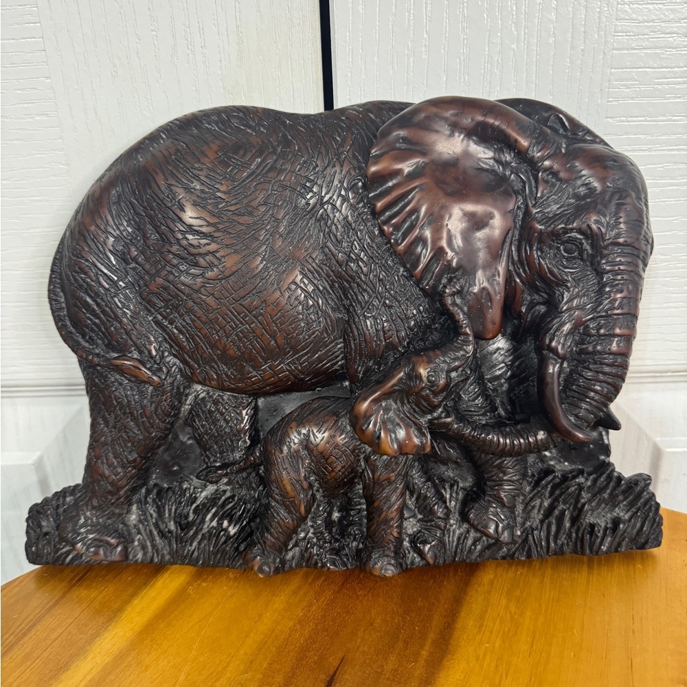 Iron wood? Carved Elephants wall hanger